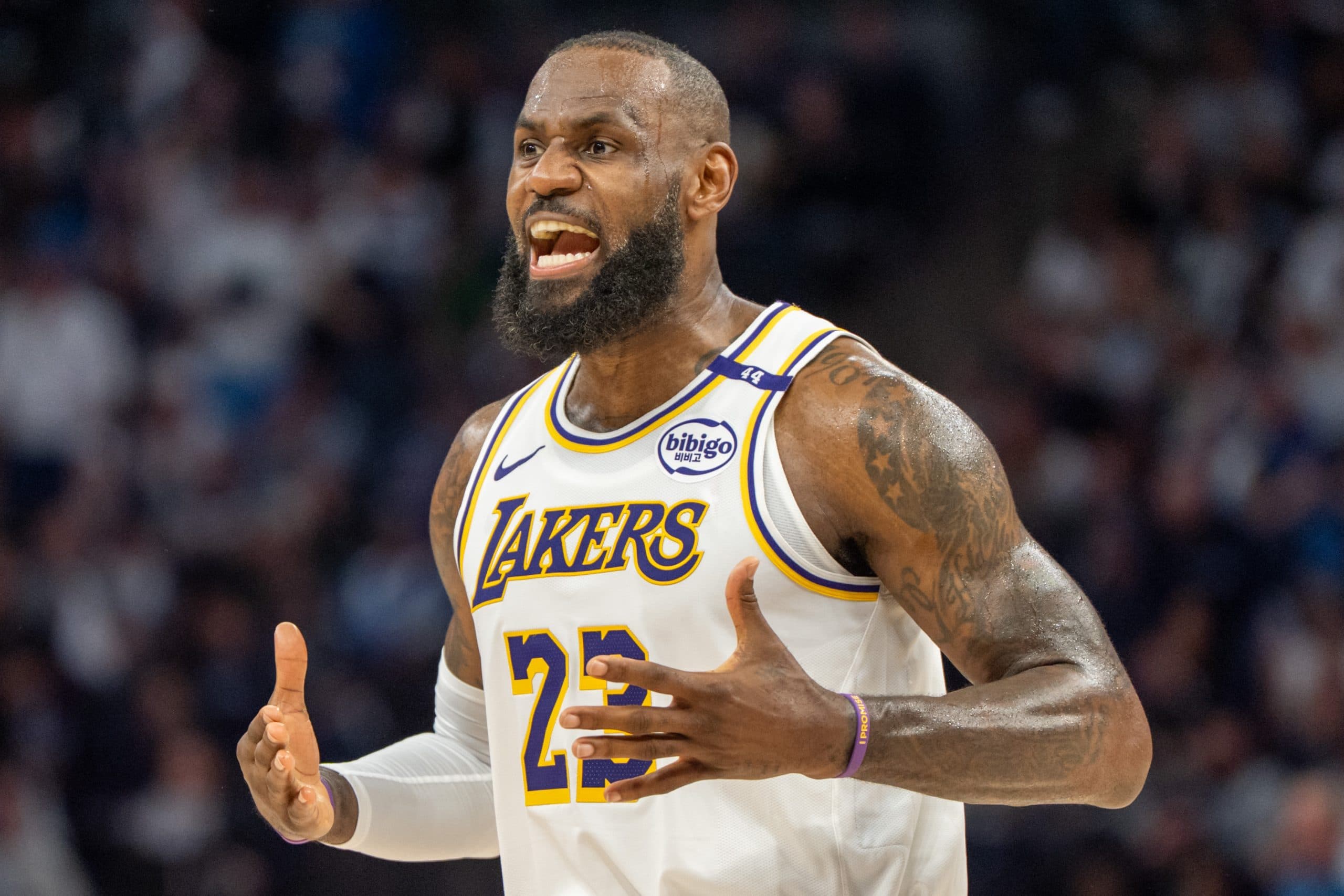 LeBron James activates his $52.6 million player option with the Lakers