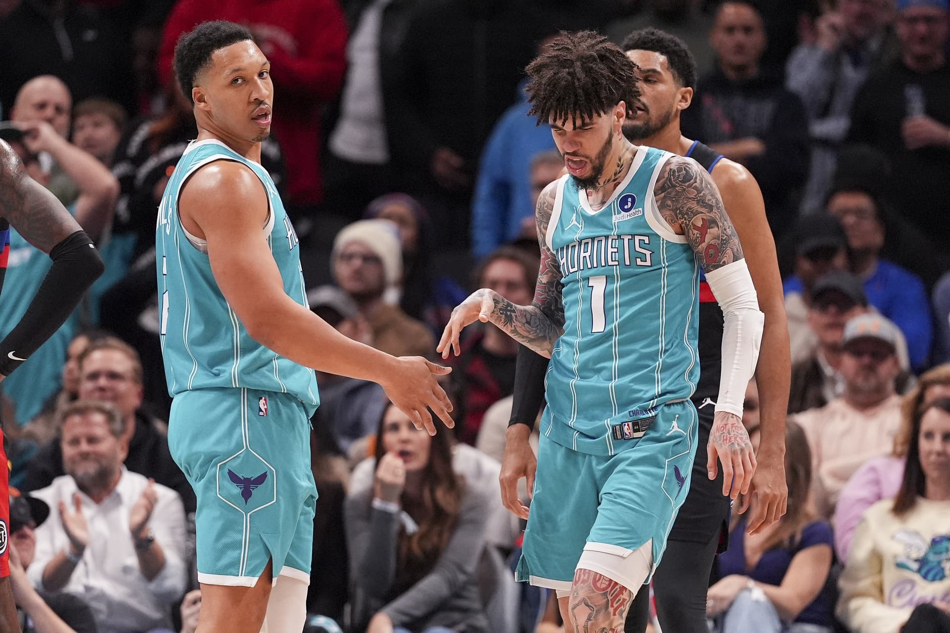 Moussa Diabaté at the center of a bench-clearing brawl between Detroit and Charlotte, four players ejected