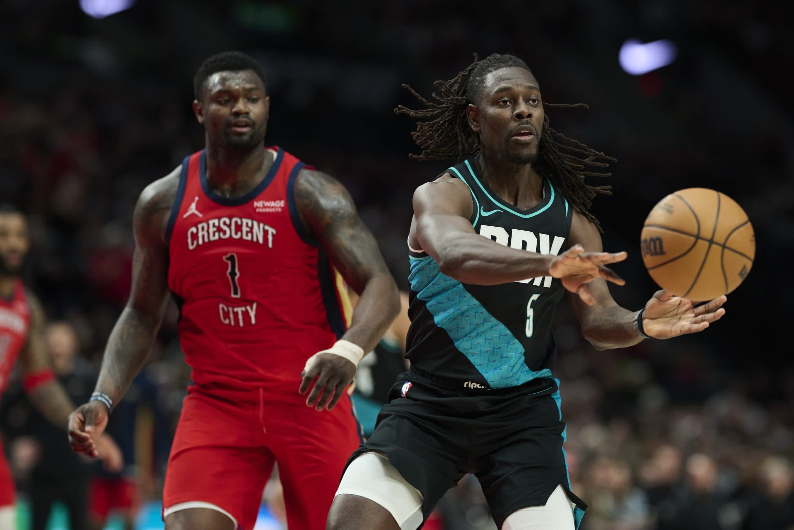 Jrue Holiday performs in front of the Blazers’ new owners