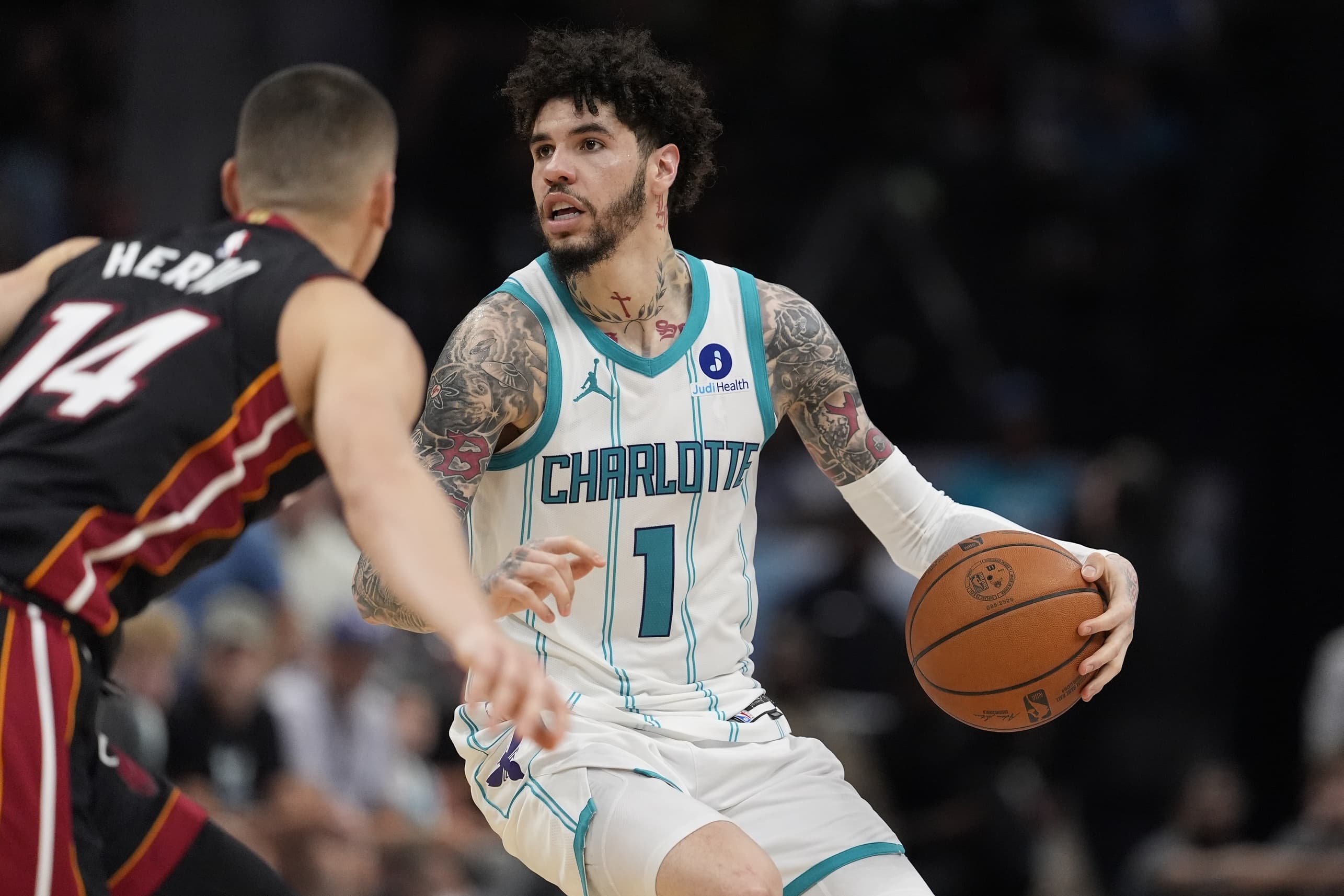 Coby White and LaMelo clutch, lift Hornets past Heat in thrilling play-in victory