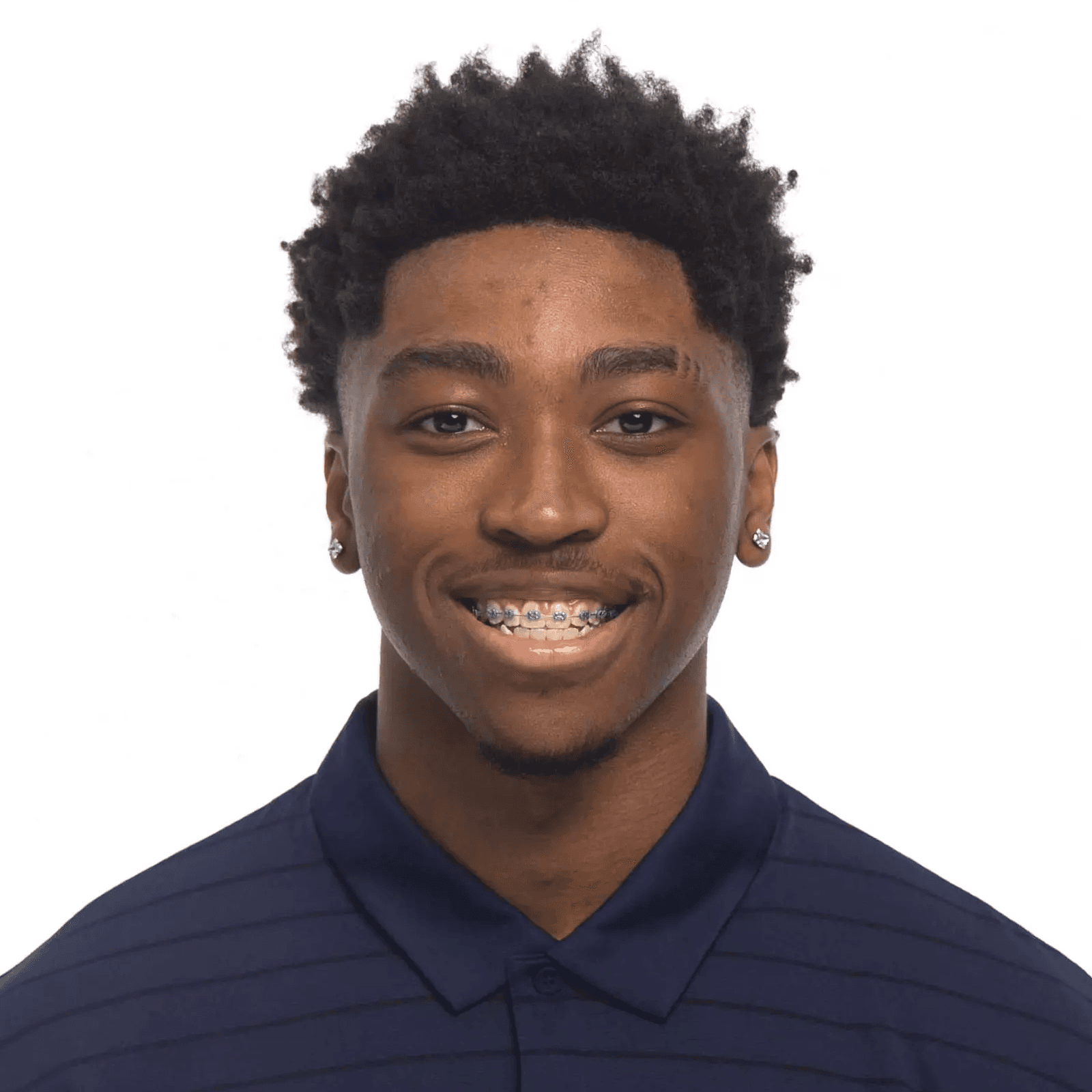 K.J. TENNER