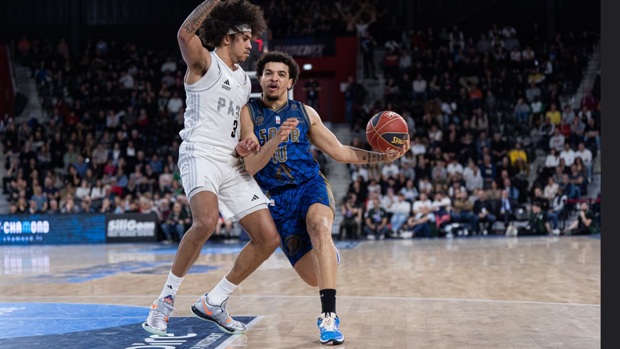 Lucas Boucaud (Saint-Quentin) driving against Paris Basketball Lucas Boucaud (Saint-Quentin) driving against Paris Basketball