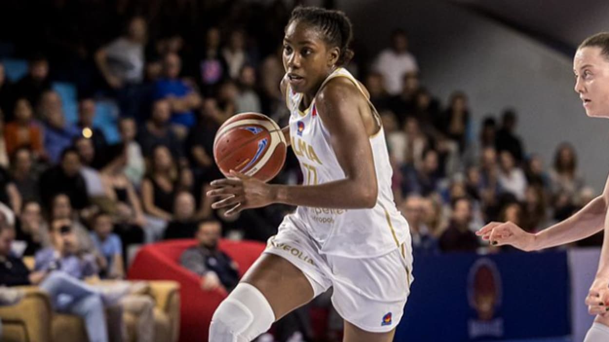 Marie-Michelle Milapie dribbling with BLMA Marie-Michelle Milapie dribbling with BLMA