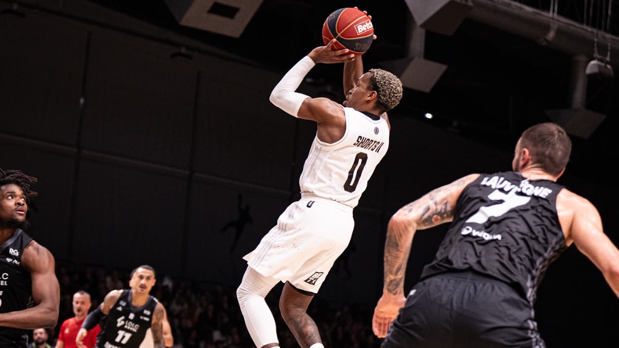 T.J. Shorts (Paris Basketball) taking a mid-range shot against ASVEL T.J. Shorts (Paris Basketball) taking a mid-range shot against ASVEL